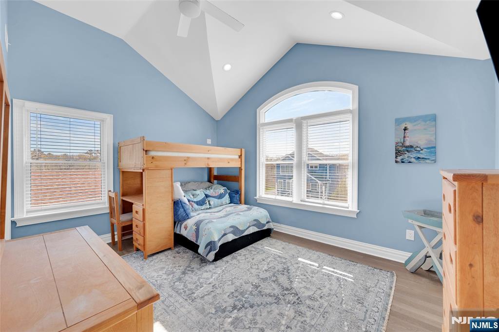 6 Capstan Road Waretown, NJ 08758 - Photo 32 of 47 a bedroom with a bed and a window
