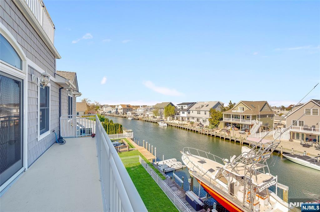 6 Capstan Road Waretown, NJ 08758 - Photo 35 of 47 a view of a balcony with lake view