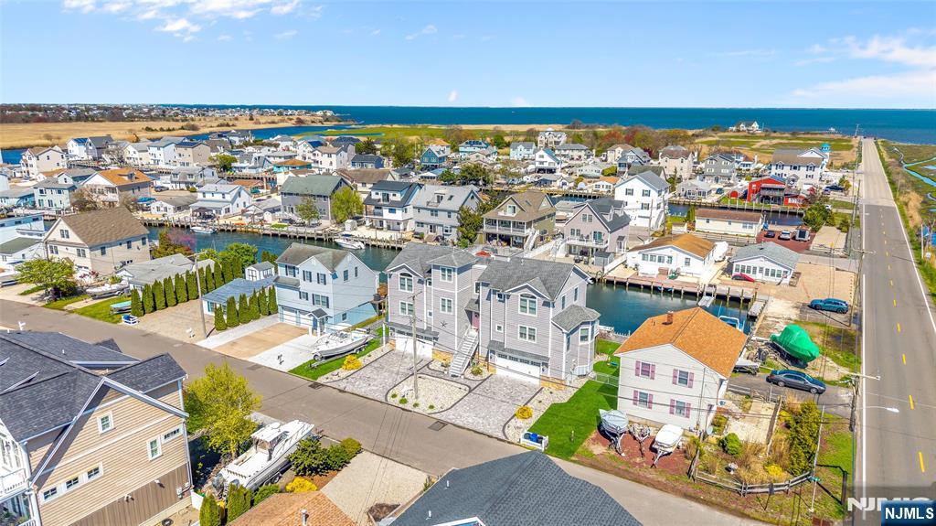 6 Capstan Road Waretown, NJ 08758 - Photo 4 of 47 an aerial view of a city with ocean view