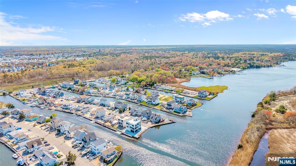 6 Capstan Road Waretown, NJ 08758 - Photo 9 of 47 an aerial view of ocean and residential houses with outdoor space