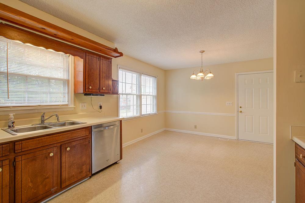 256 Pleasant Run Road Smyrna, TN 37167 - Photo 12 of 28 Large dining area, appliances remain! Access to garage from dining room.