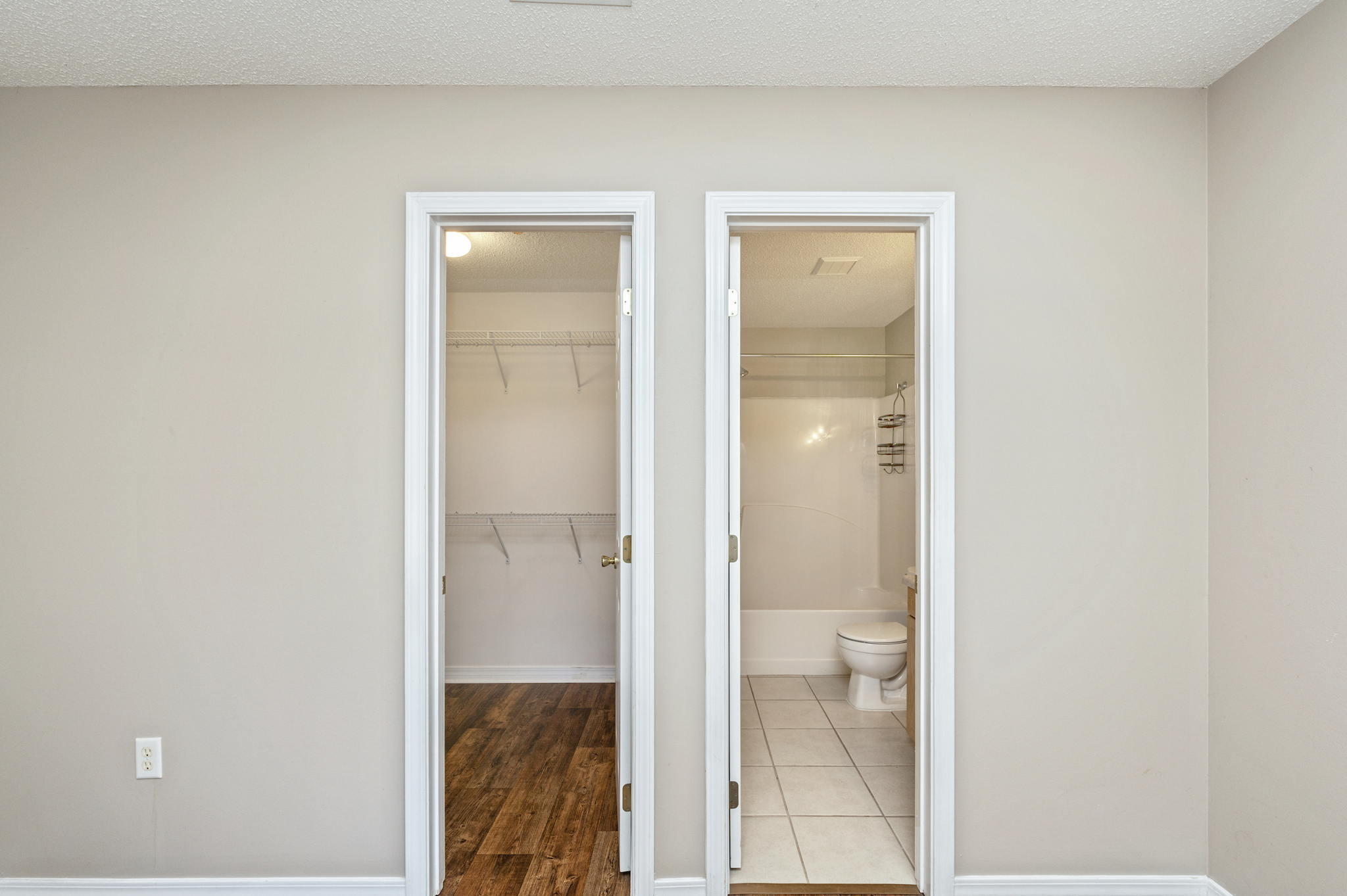 6235 Winstead Road Crestview, FL 32539 - Photo 14 of 31 a bathroom with a glass shower door