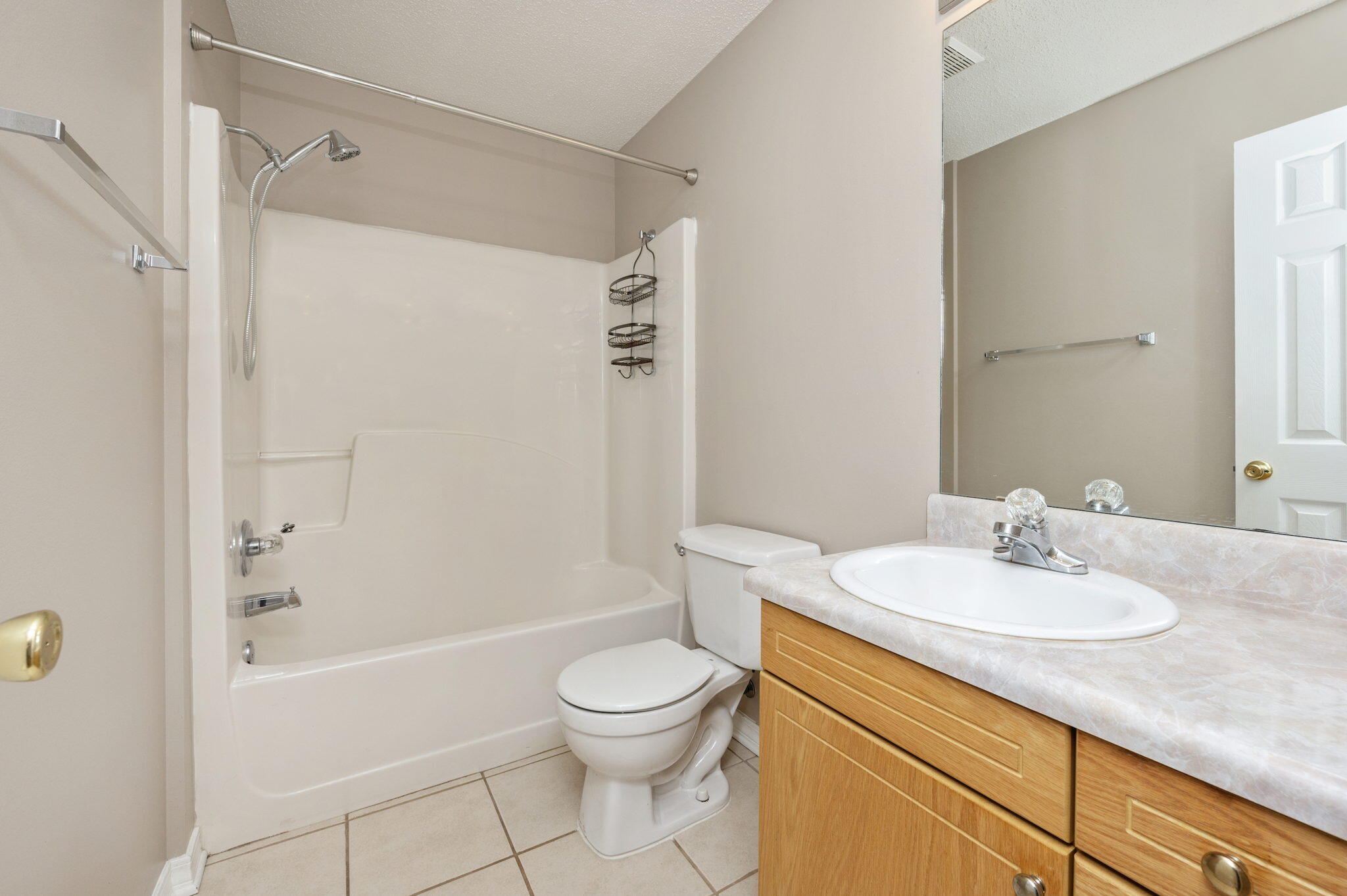 6235 Winstead Road Crestview, FL 32539 - Photo 15 of 31 a bathroom with a sink a toilet and shower