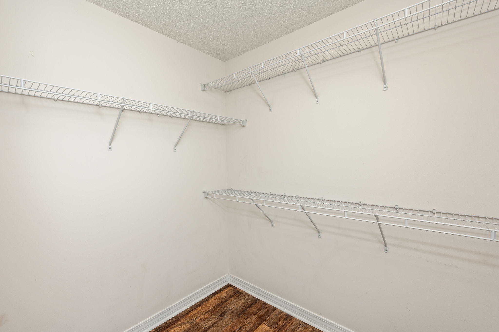 6235 Winstead Road Crestview, FL 32539 - Photo 18 of 31 a view of a room with racks on the wall