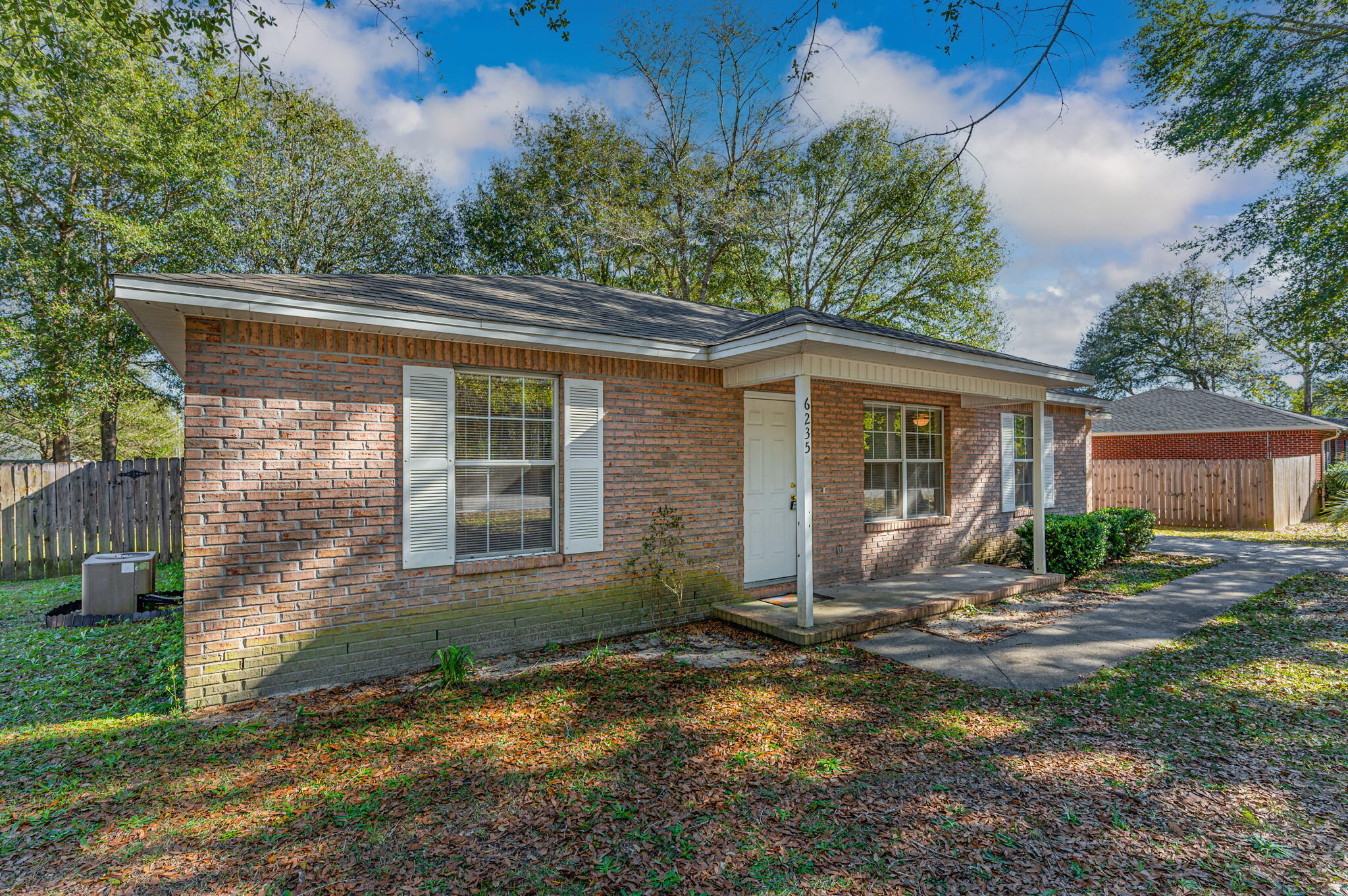 6235 Winstead Road Crestview, FL 32539 - Photo 2 of 31 front view of house with a yard