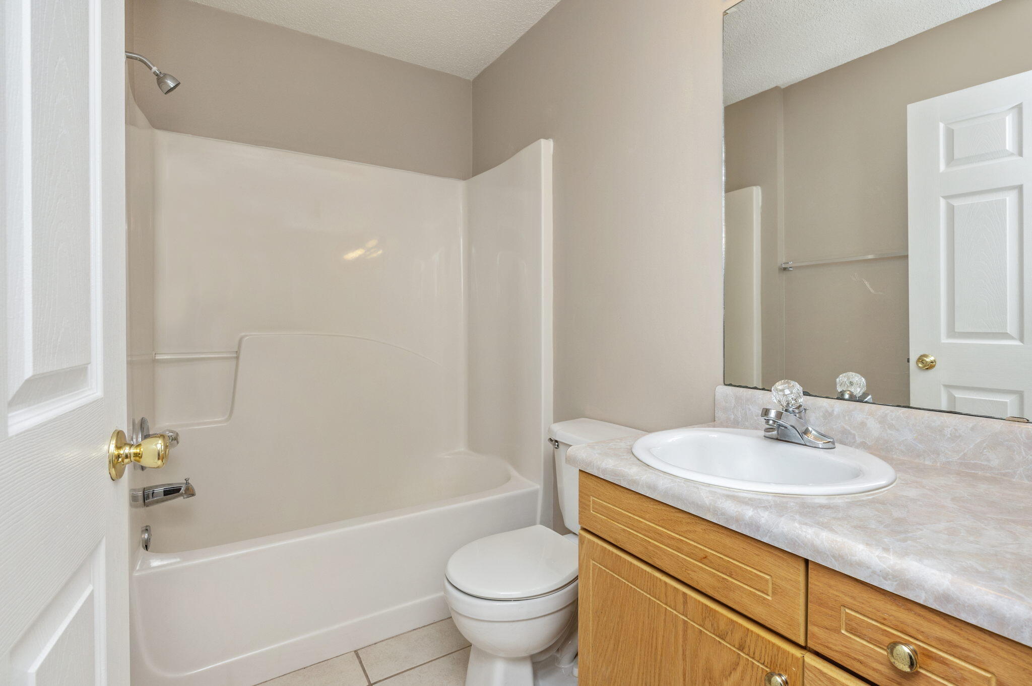 6235 Winstead Road Crestview, FL 32539 - Photo 23 of 31 a bathroom with a sink a toilet and shower