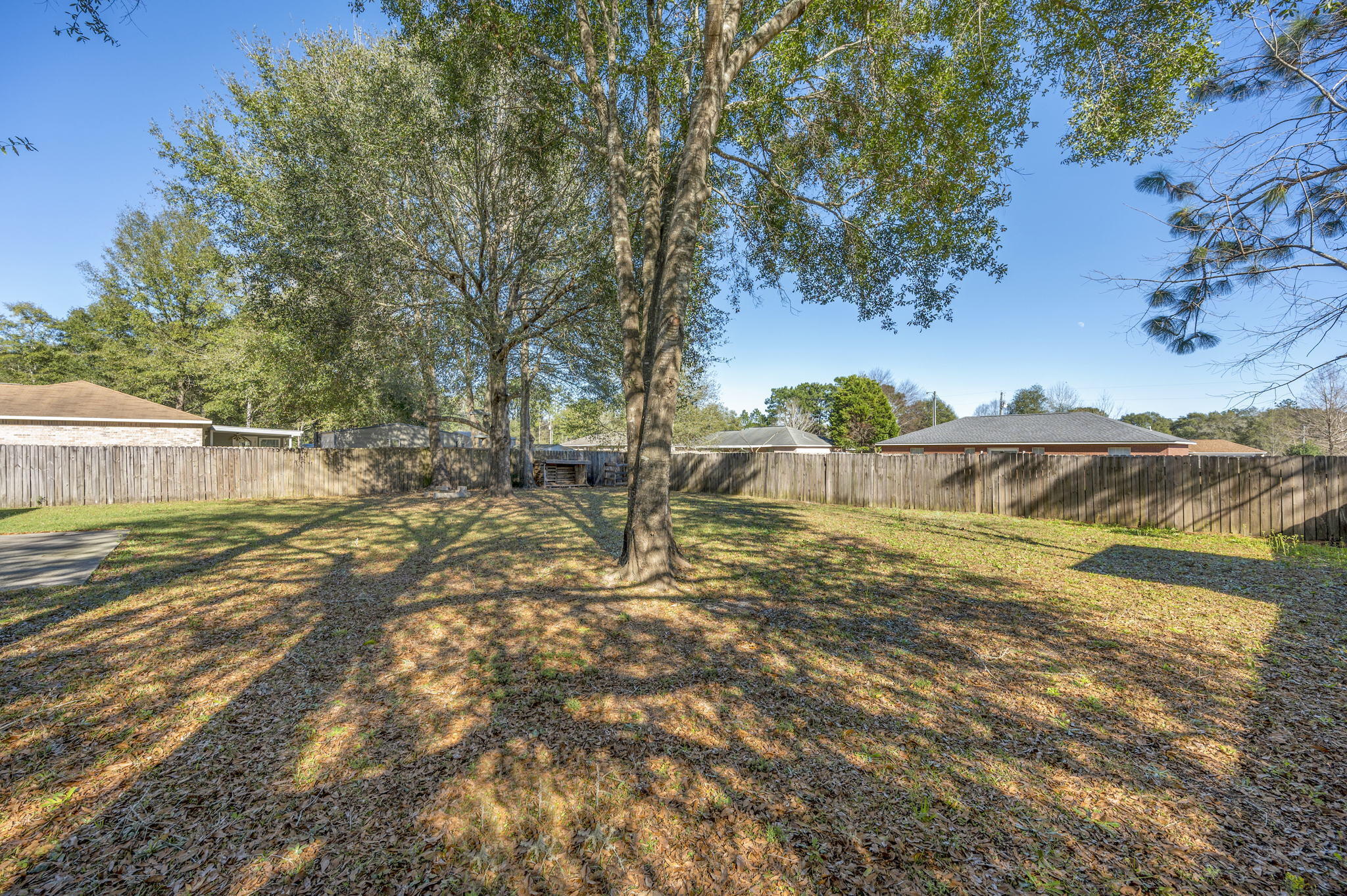 6235 Winstead Road Crestview, FL 32539 - Photo 28 of 31 a view of a yard with an outdoor space
