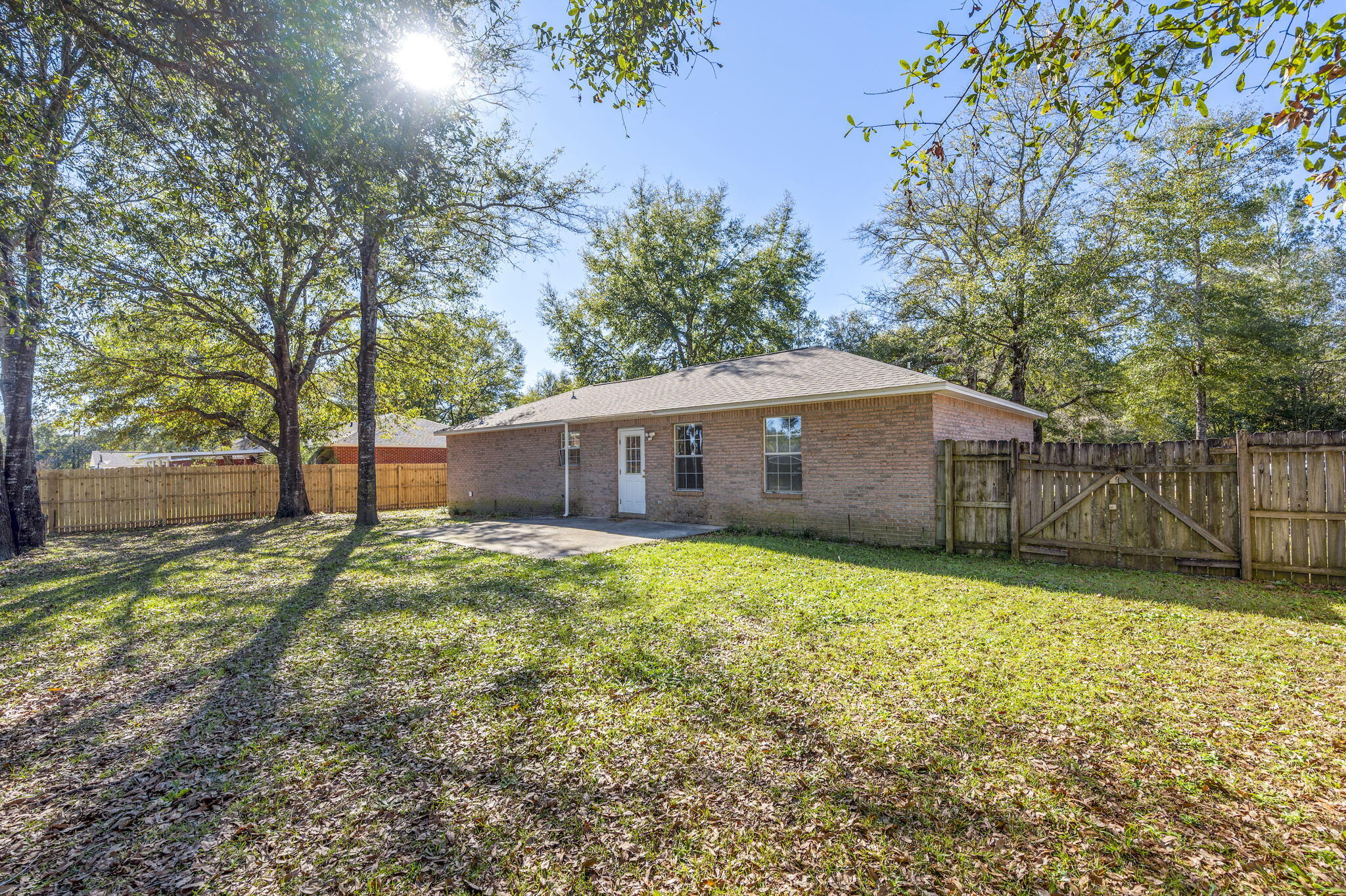 6235 Winstead Road Crestview, FL 32539 - Photo 30 of 31 a backyard of a house