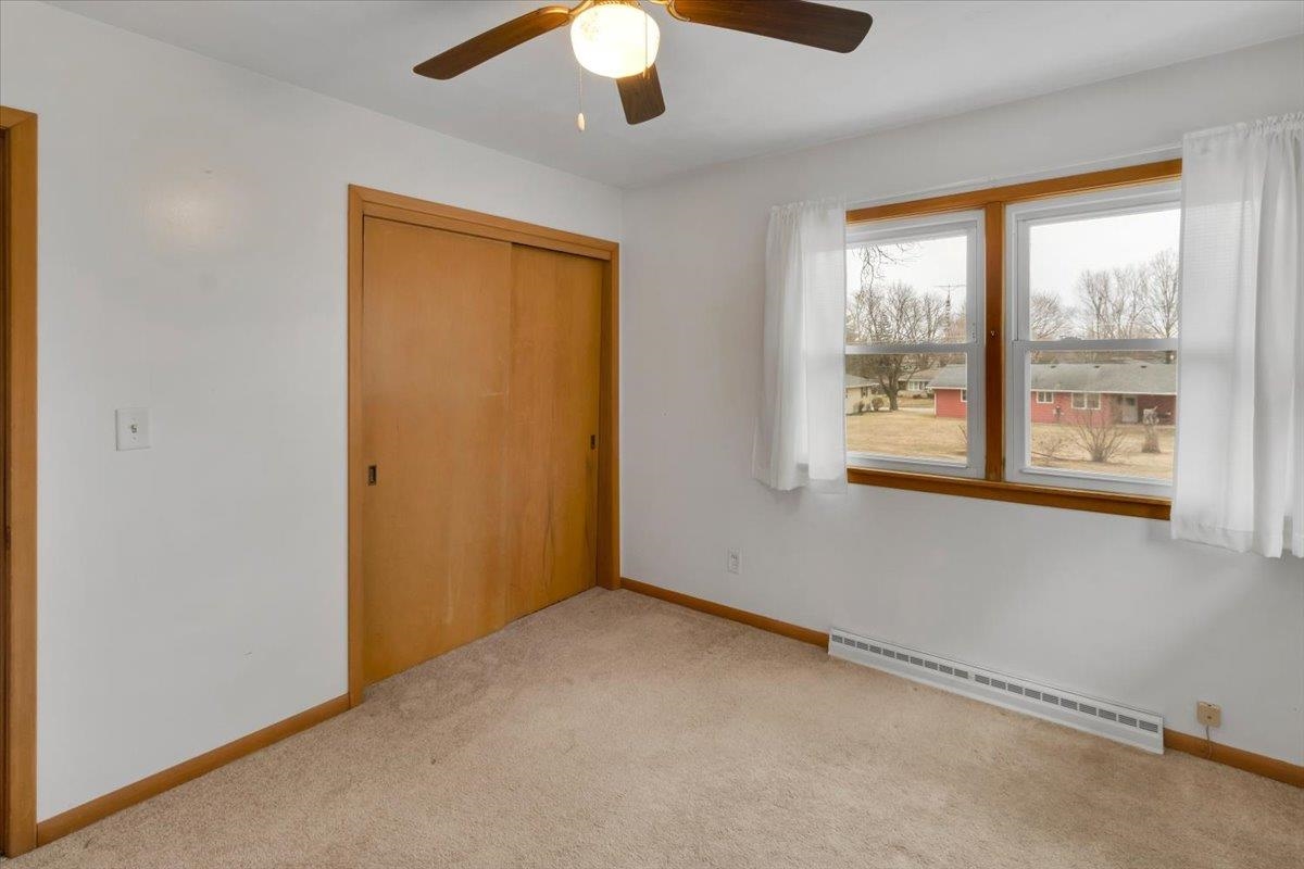 1636 Whitney Boulevard Belvidere, IL 61008 - Photo 21 of 36 a view of an empty room with a window