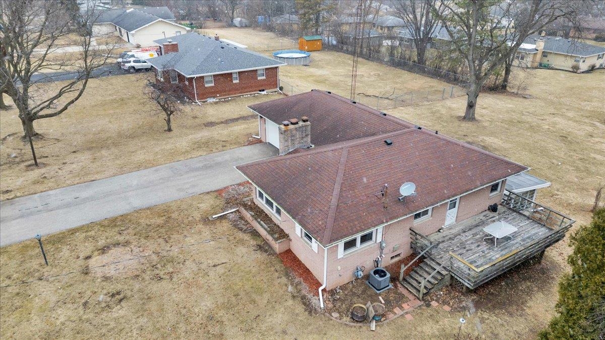 1636 Whitney Boulevard Belvidere, IL 61008 - Photo 33 of 36 an aerial view of a house with a yard
