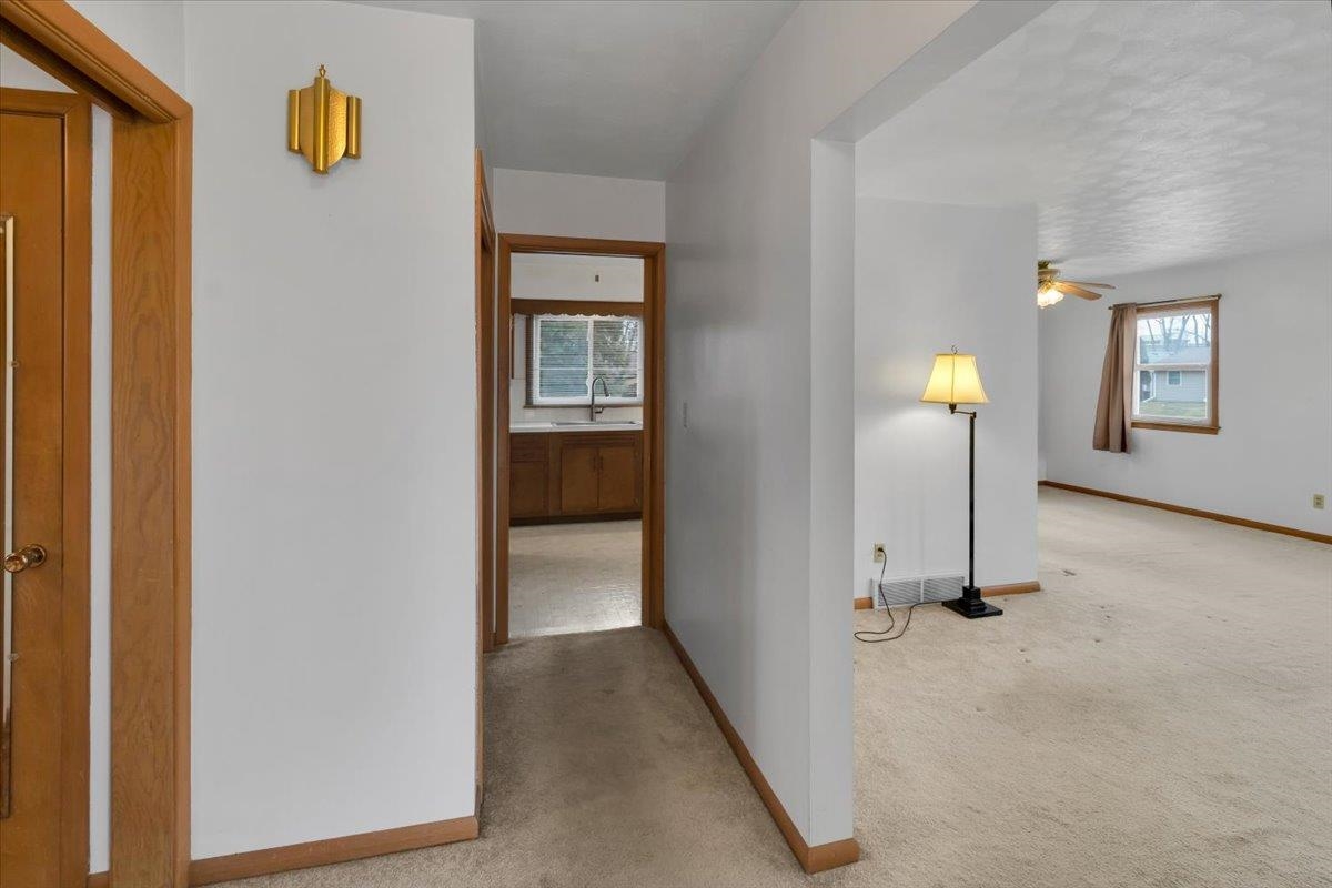 1636 Whitney Boulevard Belvidere, IL 61008 - Photo 7 of 36 a view of a hallway with a room