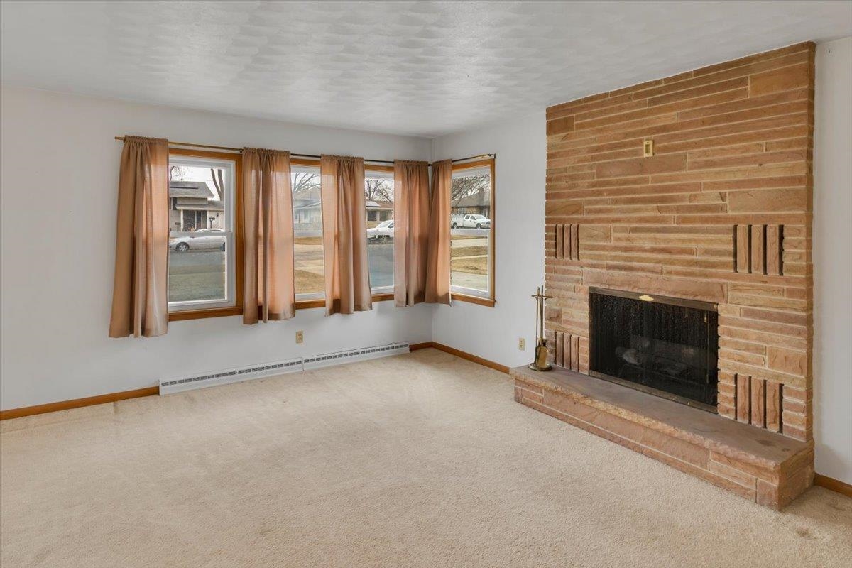 1636 Whitney Boulevard Belvidere, IL 61008 - Photo 9 of 36 an empty room with windows