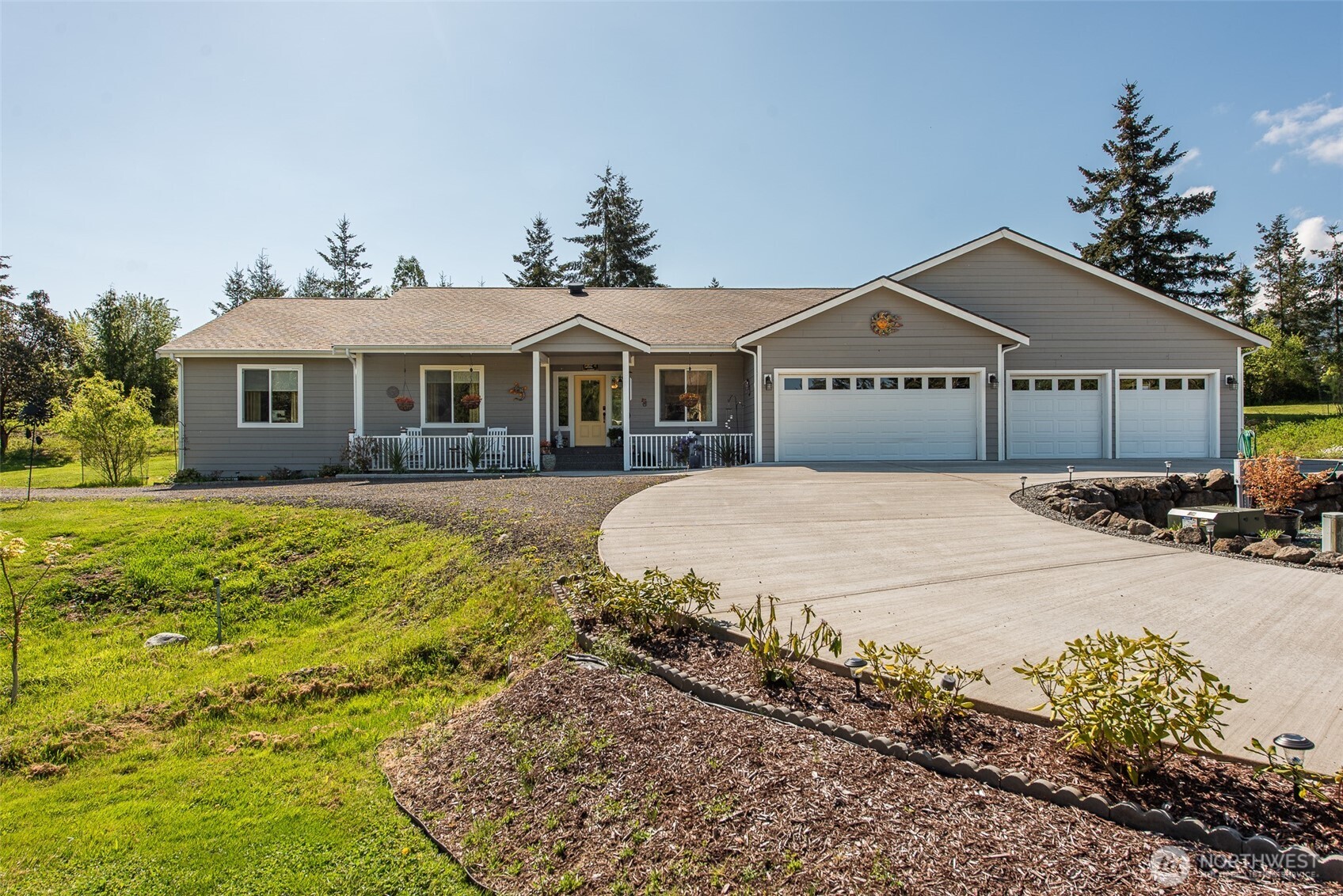 192 Michael Earl Way Sequim, WA 98382 - Photo 3 of 40 a front view of a house with a yard