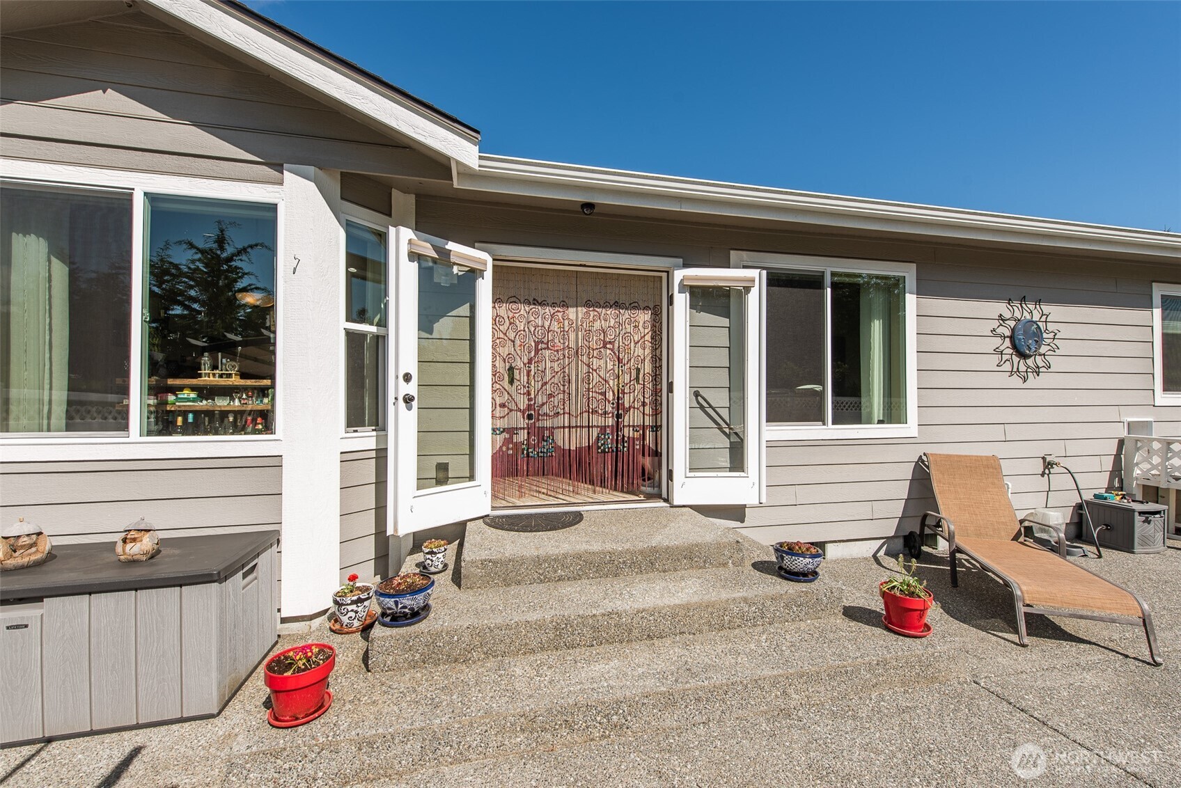 192 Michael Earl Way Sequim, WA 98382 - Photo 33 of 40 front view of house with outdoor seating