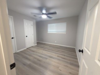 23918 Farm Hill Drive Spring, TX 77373 - Photo 11 of 16 a view of empty room with wooden floor