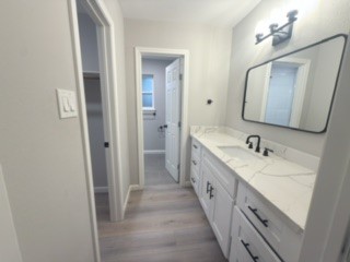 23918 Farm Hill Drive Spring, TX 77373 - Photo 12 of 16 a bathroom with a double vanity sink and a mirror