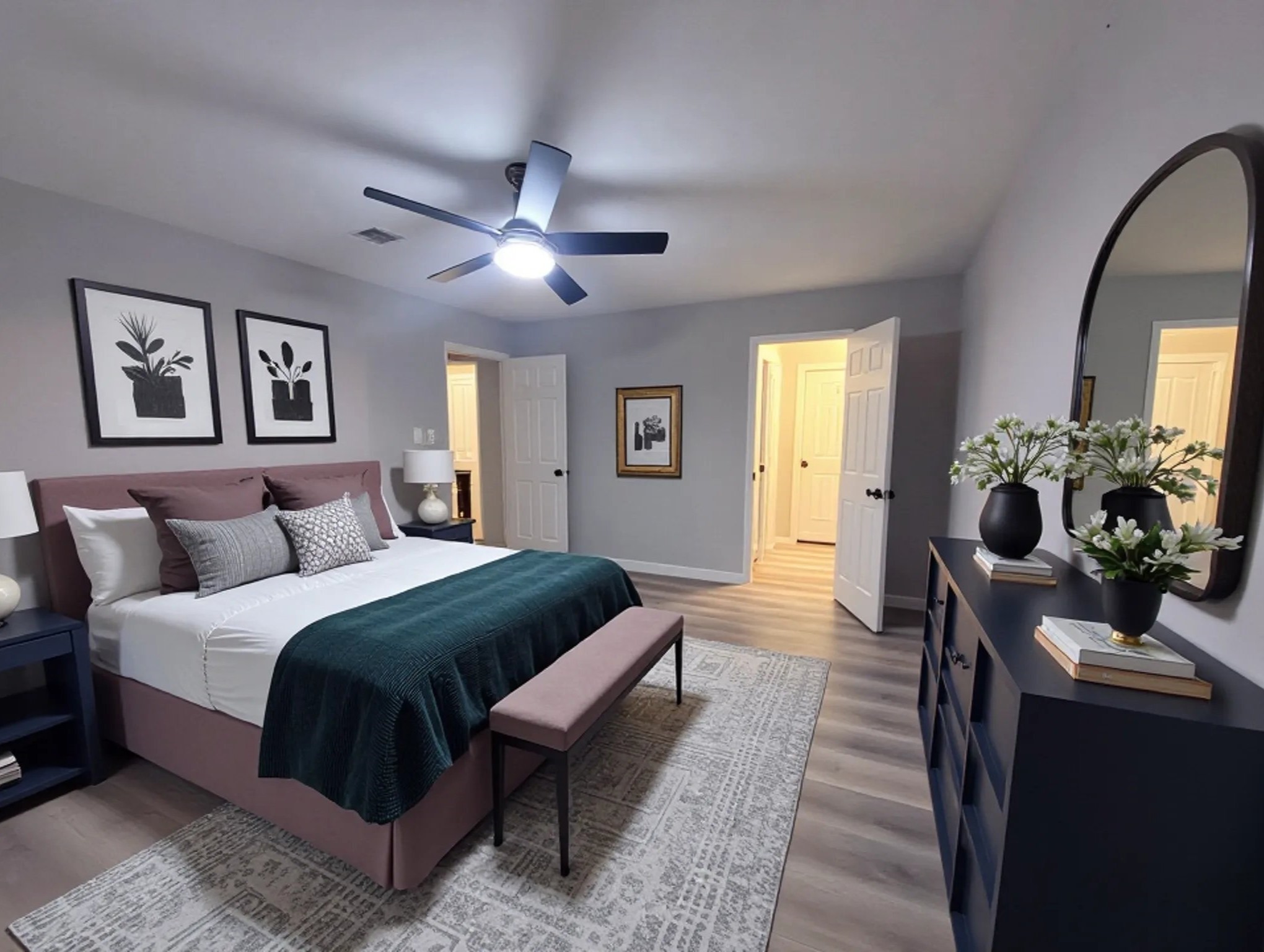23918 Farm Hill Drive Spring, TX 77373 - Photo 9 of 16 a spacious bedroom with a bed and a chandelier