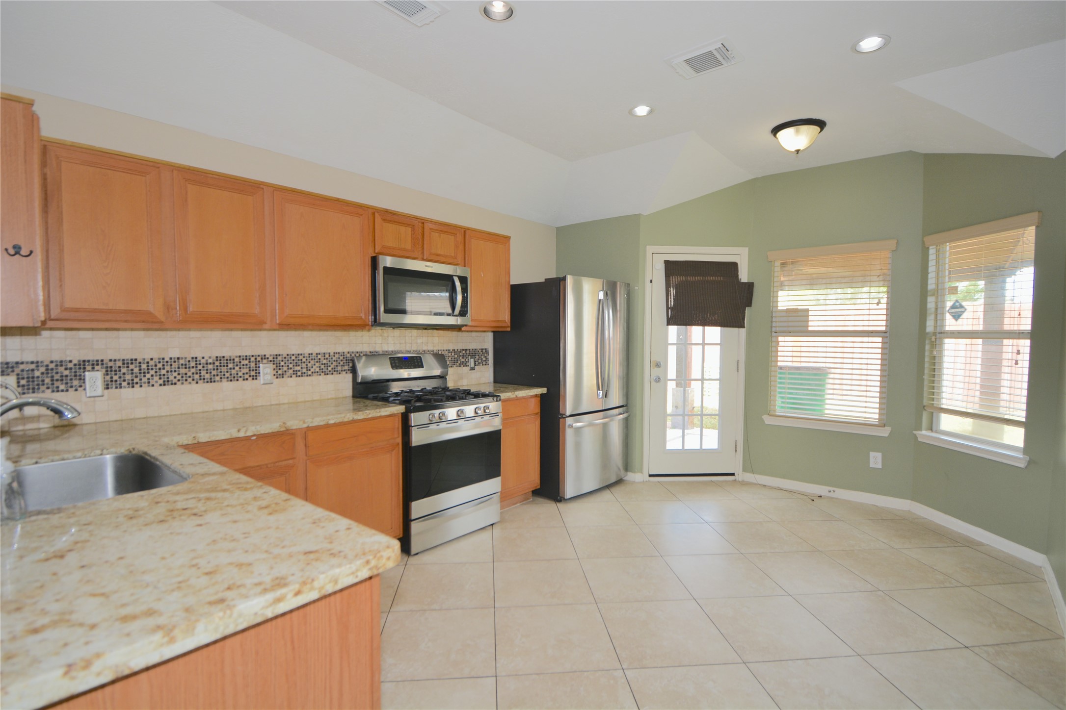 5135 Rustling Branch Lane Katy, TX 77449 - Photo 4 of 16 Kitchen backyard view