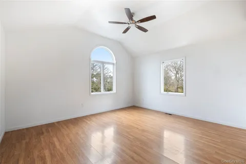 a bathroom with a tub a sink and a shower