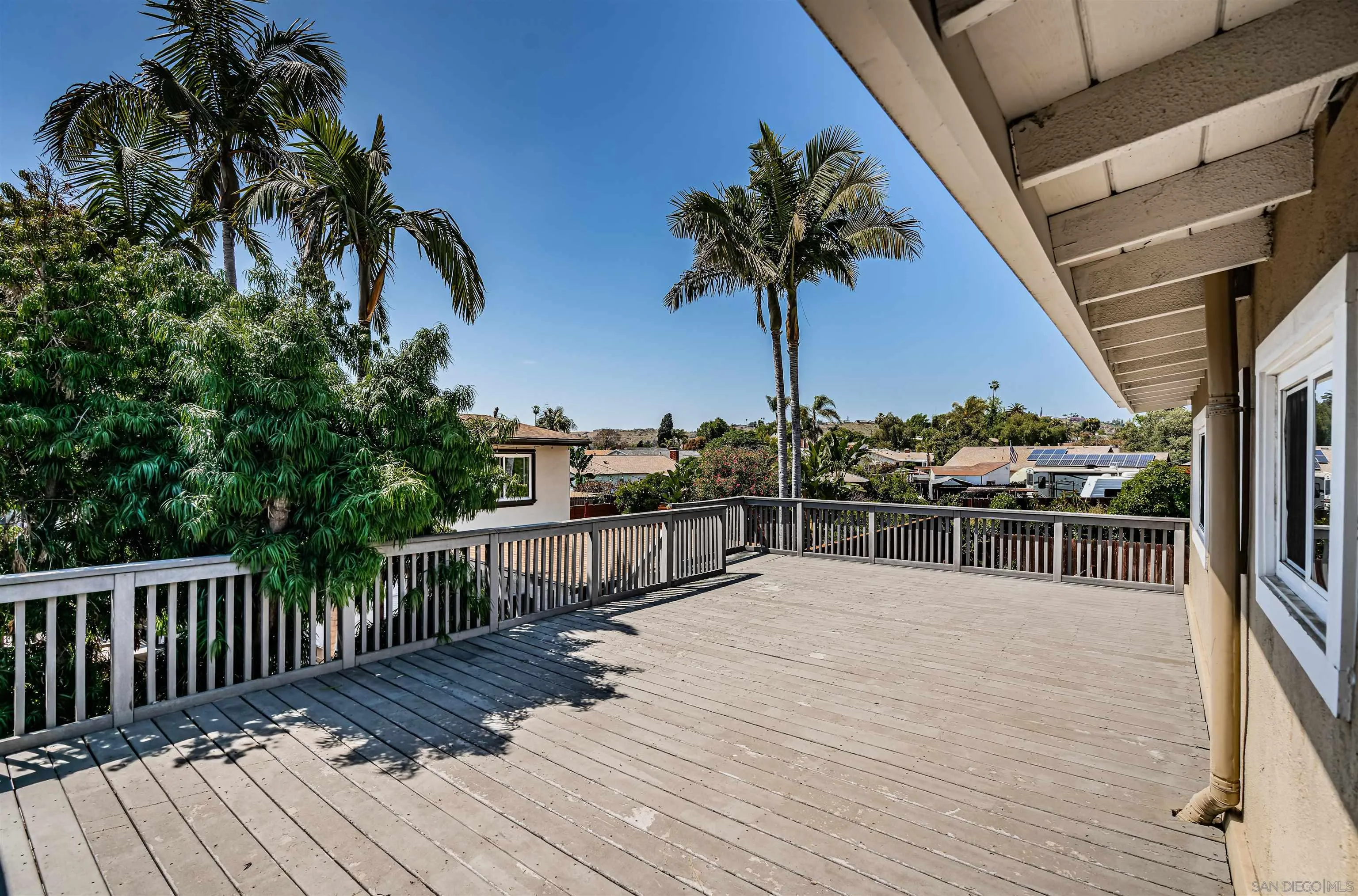8410 Roy Street Lemon Grove, CA 91945 - Photo 17 of 40 a balcony with view of palm trees