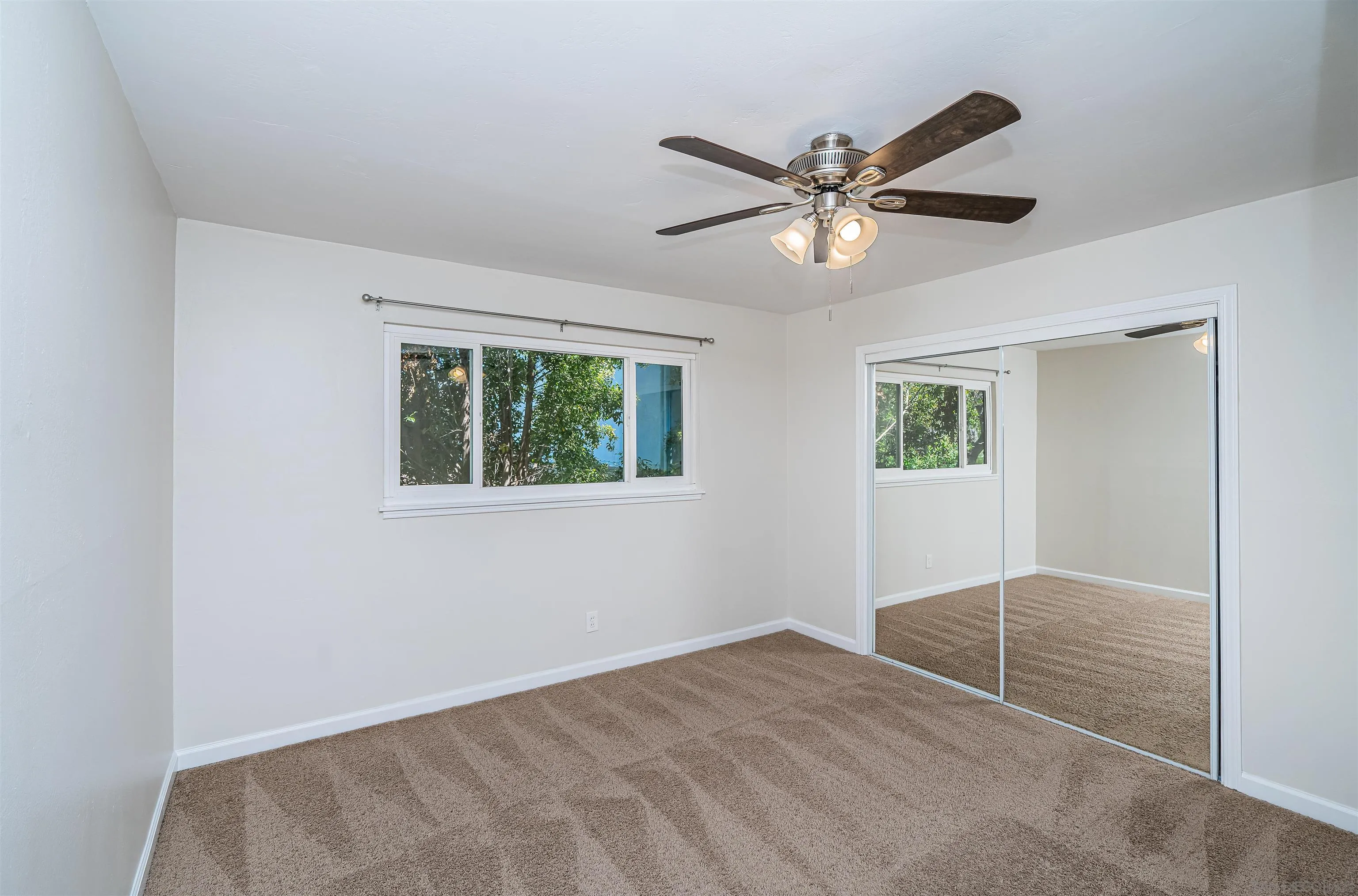 8410 Roy Street Lemon Grove, CA 91945 - Photo 23 of 40 a view of an empty room with a window
