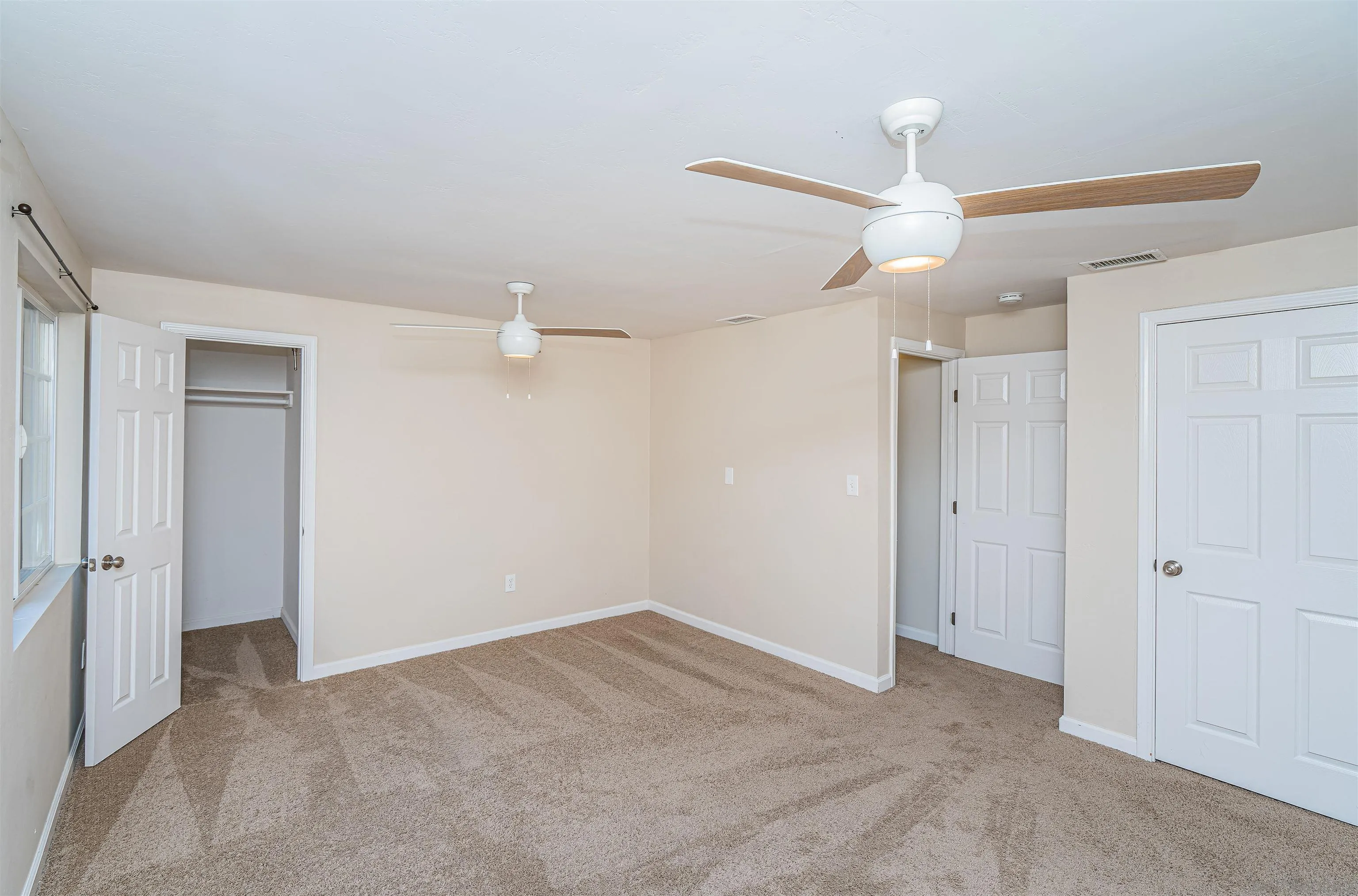 8410 Roy Street Lemon Grove, CA 91945 - Photo 26 of 40 wooden floor in an empty room with a window