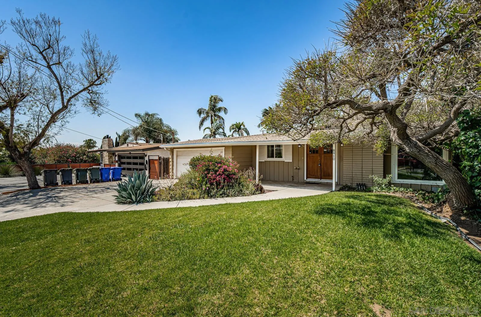 8410 Roy Street Lemon Grove, CA 91945 - Photo 3 of 40 a view of a house with a yard