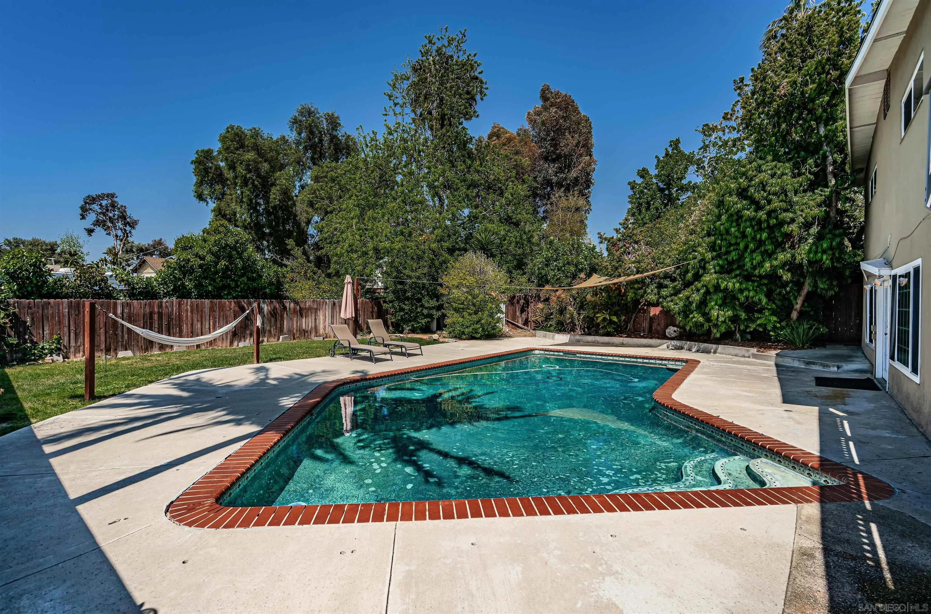 8410 Roy Street Lemon Grove, CA 91945 - Photo 36 of 40 a view of a yard with a sitting area