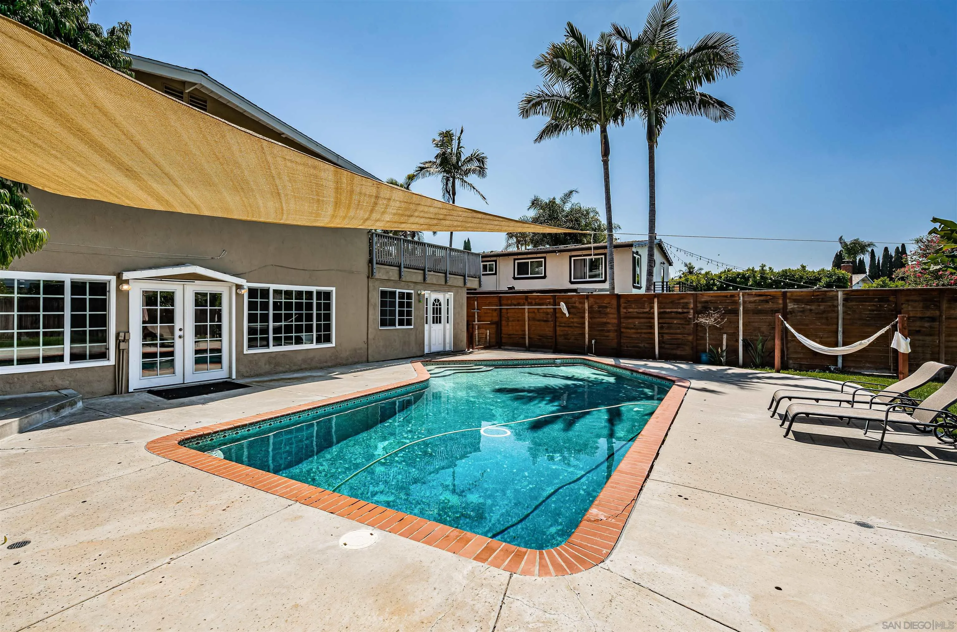 8410 Roy Street Lemon Grove, CA 91945 - Photo 38 of 40 a view of a backyard with a swimming pool
