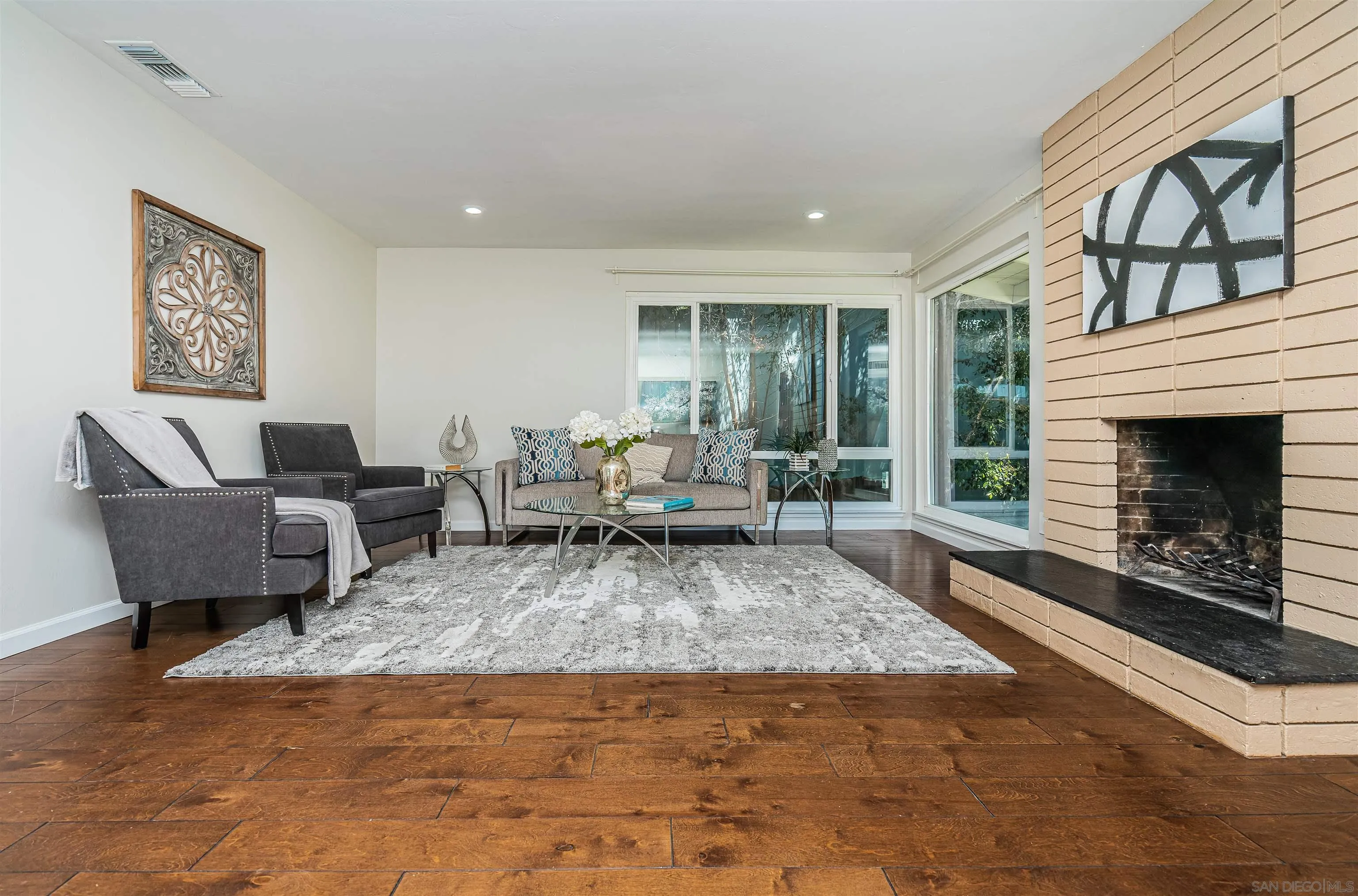 8410 Roy Street Lemon Grove, CA 91945 - Photo 7 of 40 a living room with furniture and a fireplace