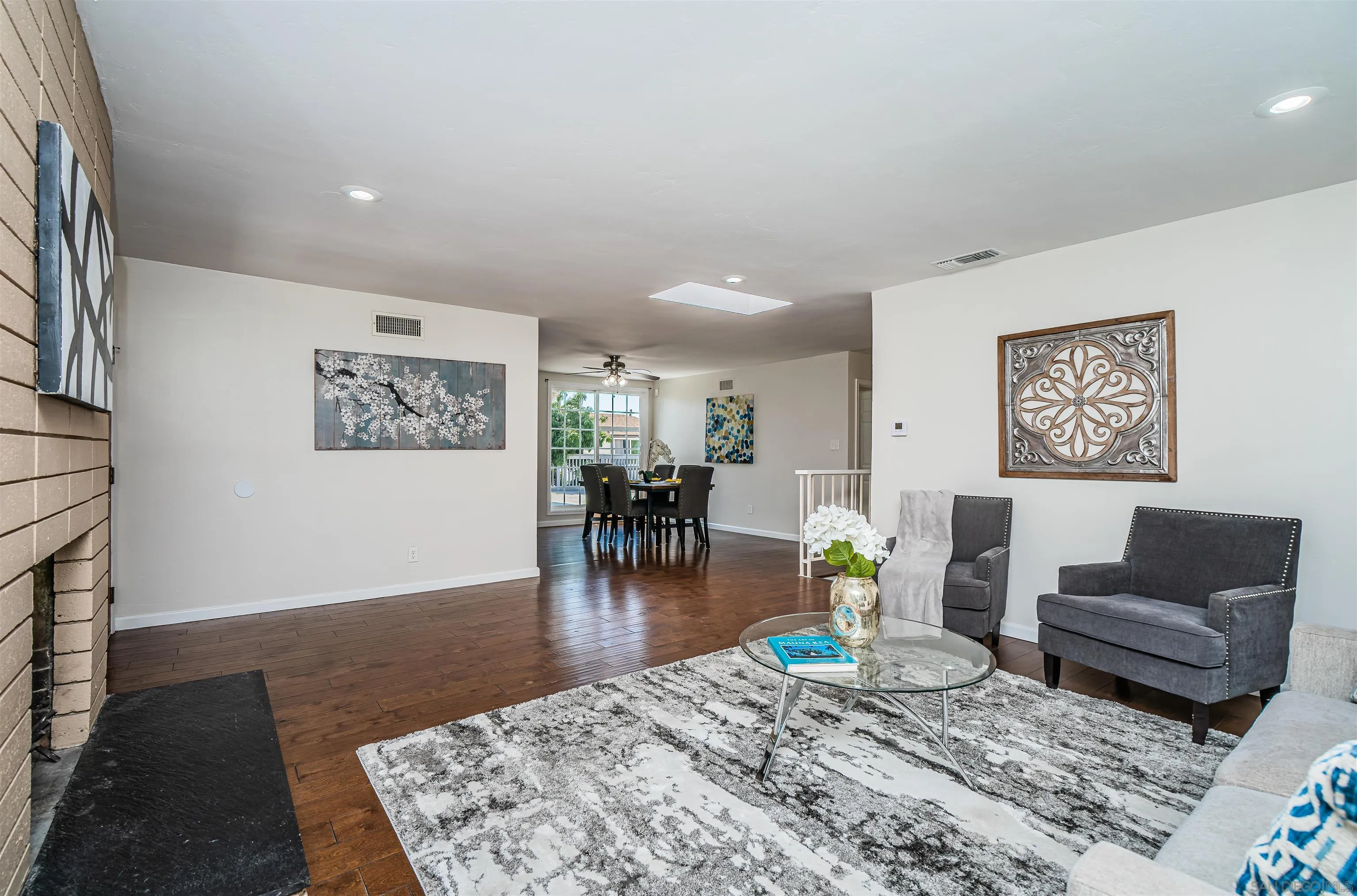 8410 Roy Street Lemon Grove, CA 91945 - Photo 9 of 40 a living room with furniture and a wooden floor