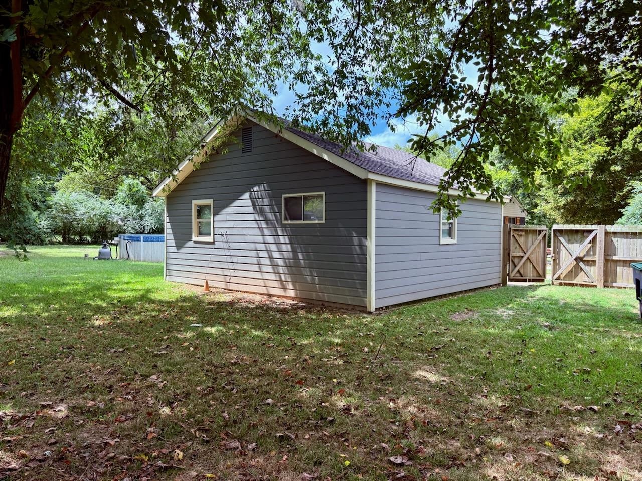 a house view with a garden space