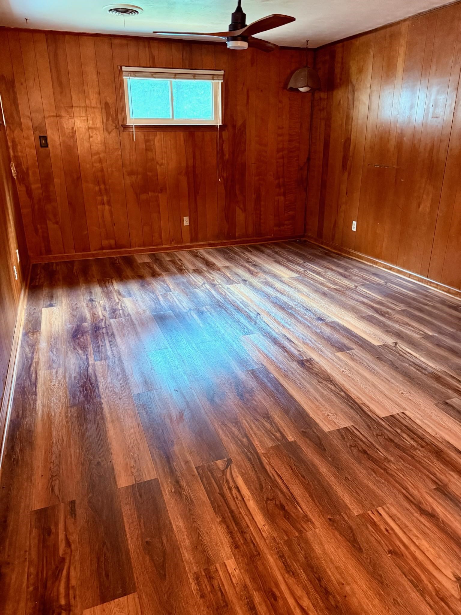 458 Gerald Road Memphis, TN 38122 - Photo 17 of 34 a view of an empty room with wooden floor