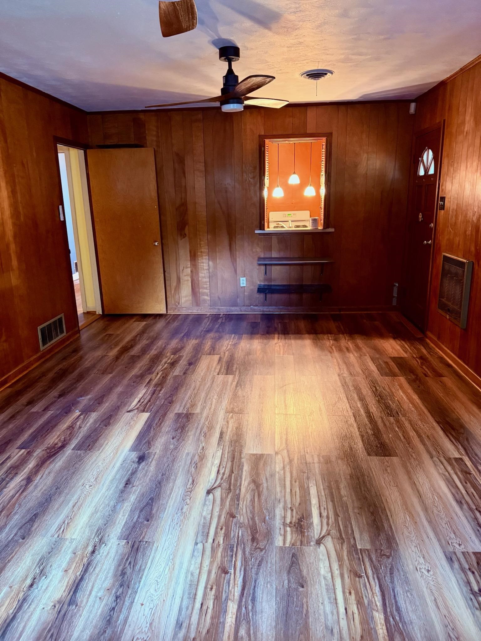 458 Gerald Road Memphis, TN 38122 - Photo 18 of 34 a view of room with wooden floor and windows