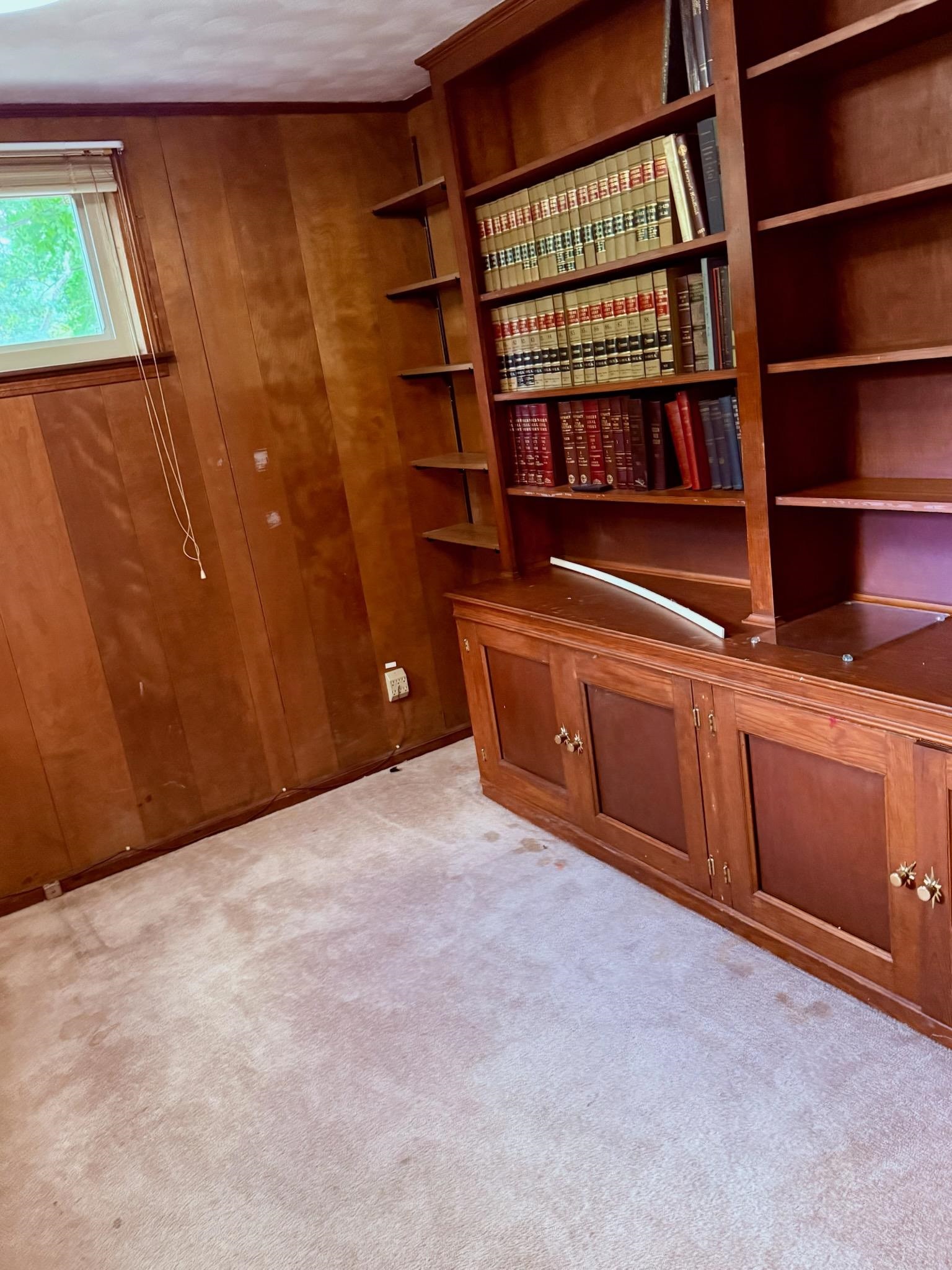 458 Gerald Road Memphis, TN 38122 - Photo 20 of 34 a view of an empty room with shelves