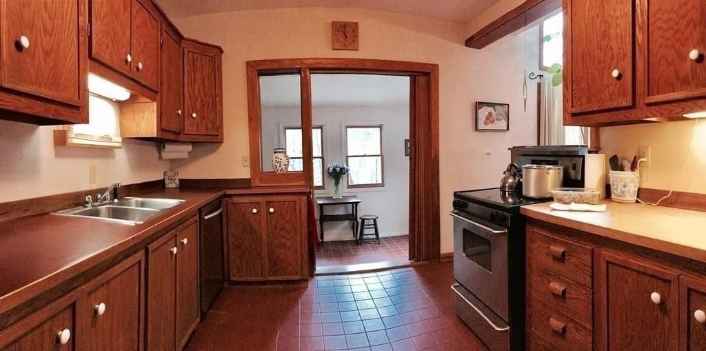 15 Number 6 Road Leverett, MA 01054 - Photo 11 of 40 a kitchen with granite countertop a sink stove and cabinets