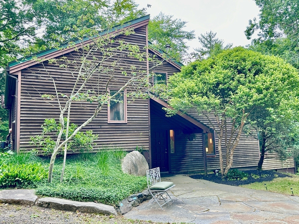 15 Number 6 Road Leverett, MA 01054 - Photo 3 of 40 a front view of a house with garden