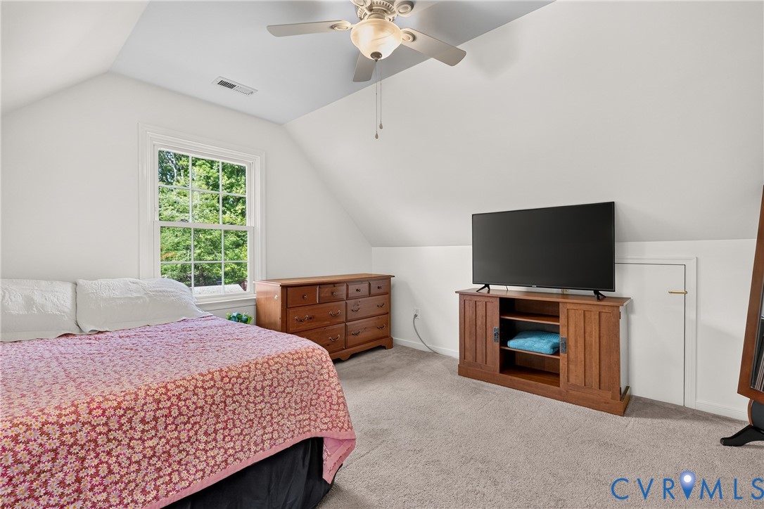 7248 Full Rack Drive Midlothian, VA 23112 - Photo 27 of 36 Vaulted ceiling with a ceiling fan