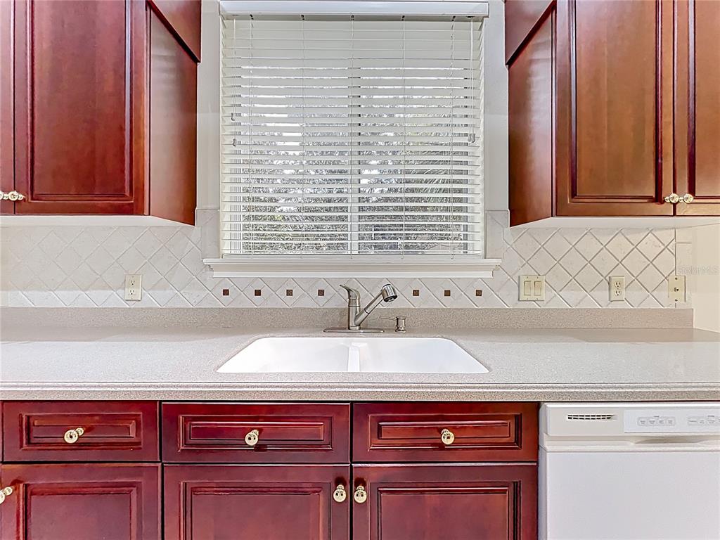 503 Camino Real, Unit 503 Howey-in-the-Hills, FL 34737 - Photo 20 of 65 a view of a sink and a window