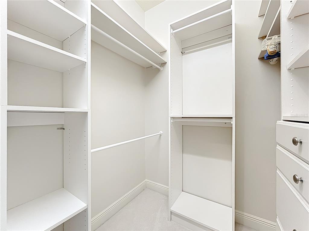 503 Camino Real, Unit 503 Howey-in-the-Hills, FL 34737 - Photo 27 of 65 a view of walk in closet