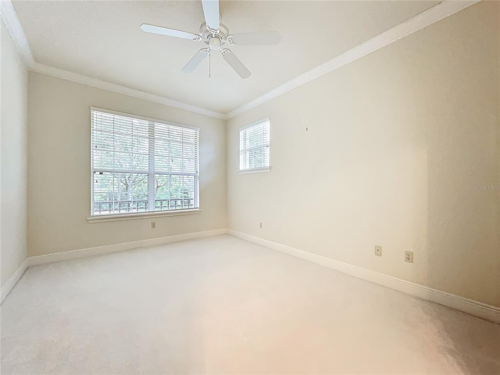 503 Camino Real, Unit 503 Howey-in-the-Hills, FL 34737 - Photo 36 of 65 an empty room with a window