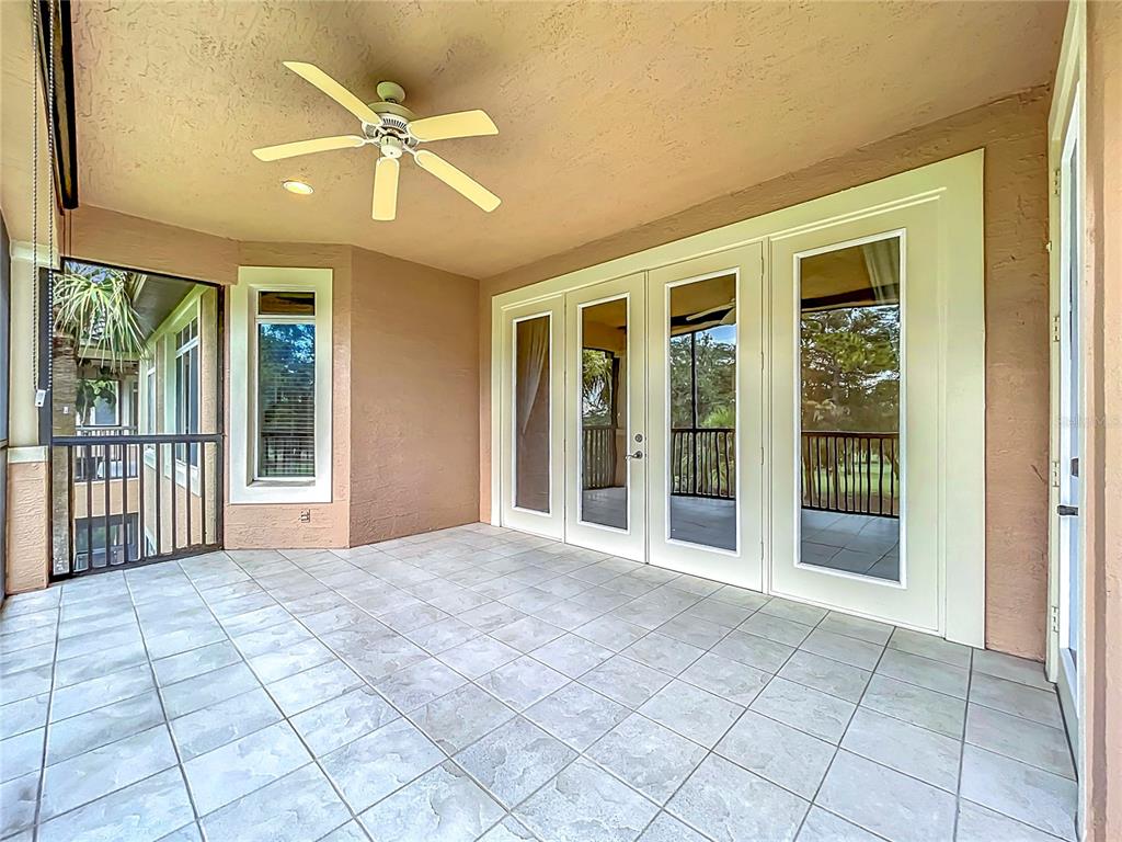 503 Camino Real, Unit 503 Howey-in-the-Hills, FL 34737 - Photo 45 of 65 a view of an entryway with a ceiling fan