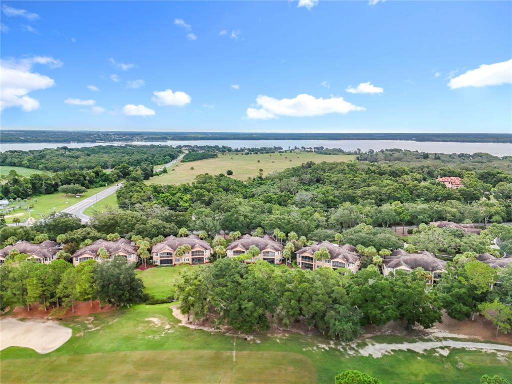 503 Camino Real, Unit 503 Howey-in-the-Hills, FL 34737 - Photo 59 of 65 an aerial view of a city