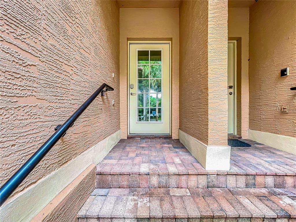 503 Camino Real, Unit 503 Howey-in-the-Hills, FL 34737 - Photo 8 of 65 a view of a pathway with a balcony