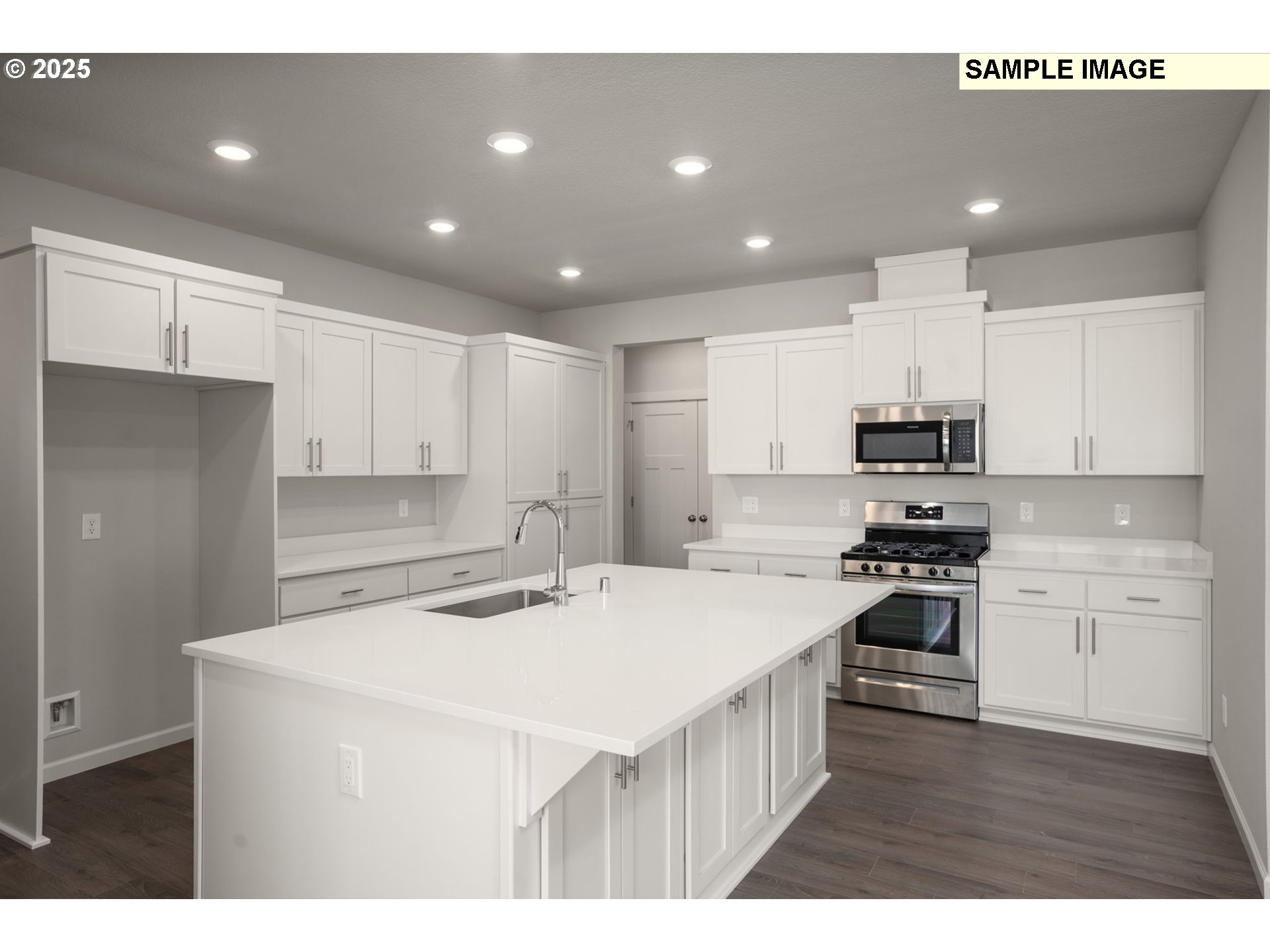 51096 Southwest Klompen Street, Unit H138 Scappoose, OR 97056 - Photo 13 of 30 a kitchen with a stove a sink and a refrigerator