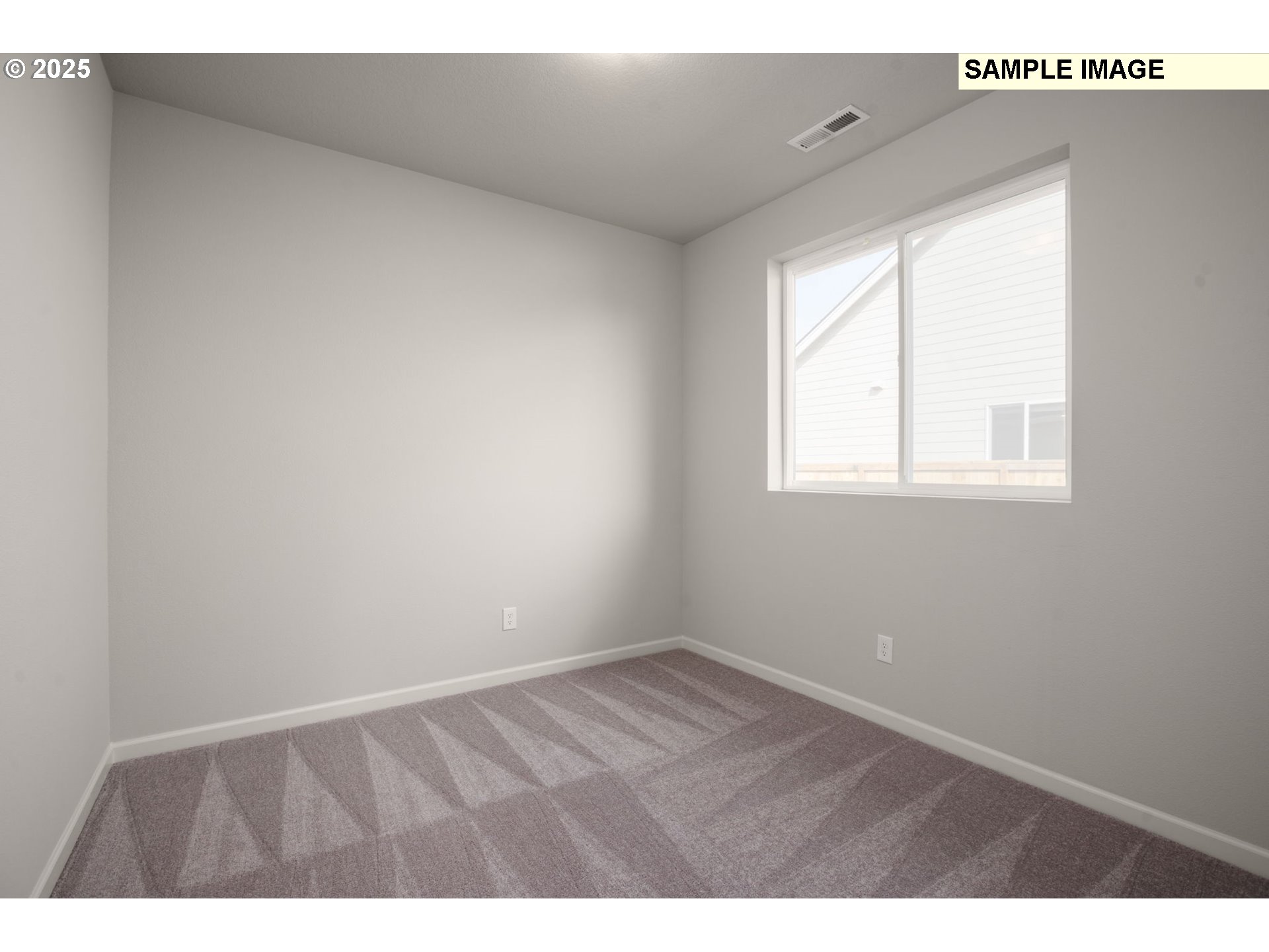 51096 Southwest Klompen Street, Unit H138 Scappoose, OR 97056 - Photo 29 of 30 a view of an empty room with a window