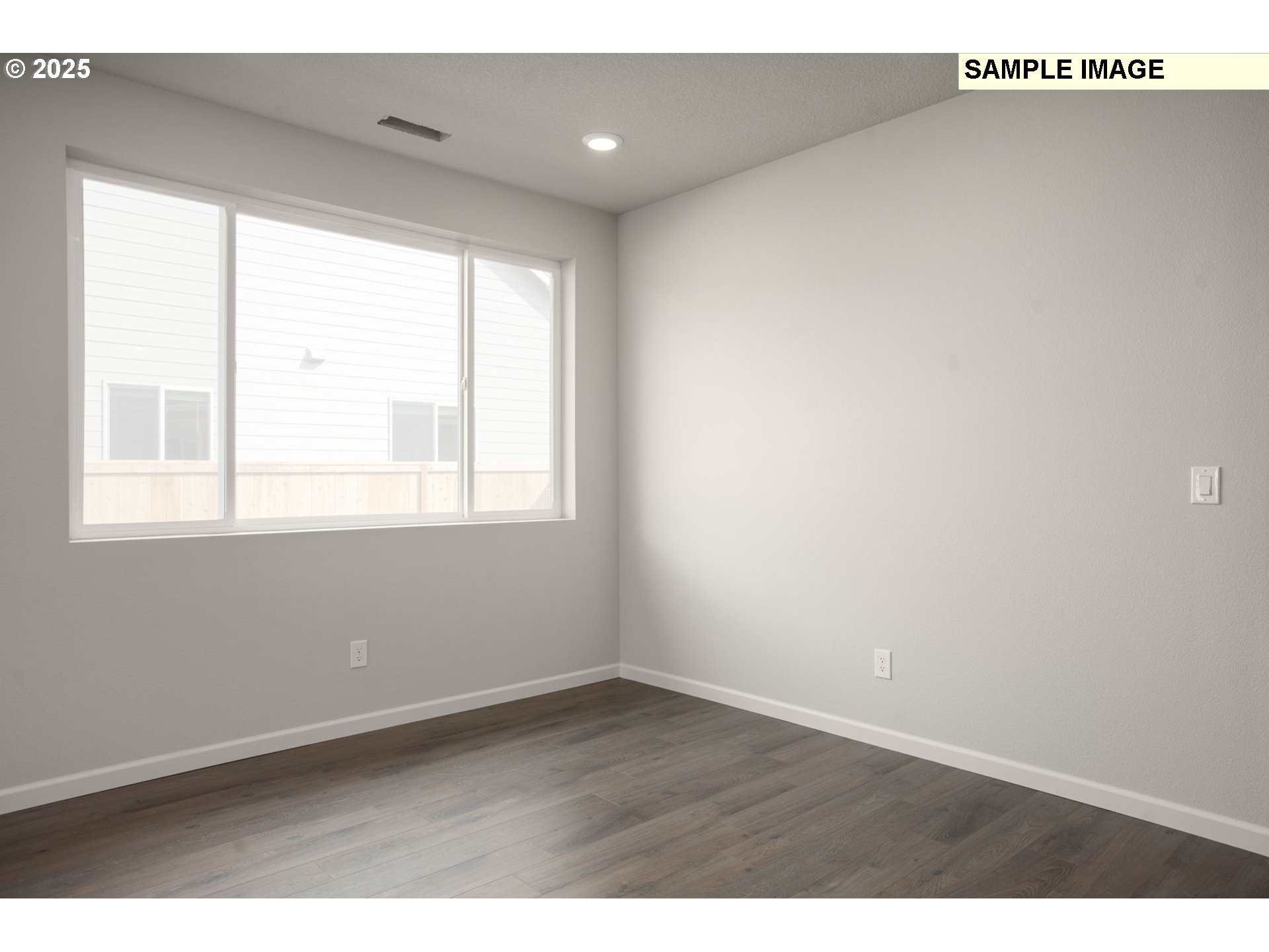 51096 Southwest Klompen Street, Unit H138 Scappoose, OR 97056 - Photo 30 of 30 a view of an empty room with a window