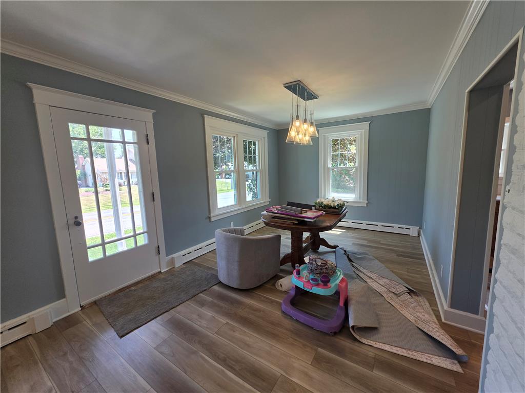 601 Cherry Hill Road Nazareth, PA 18064 - Photo 16 of 27 Hardwood flooring extends throughout this versatile room, offering ample natural light.