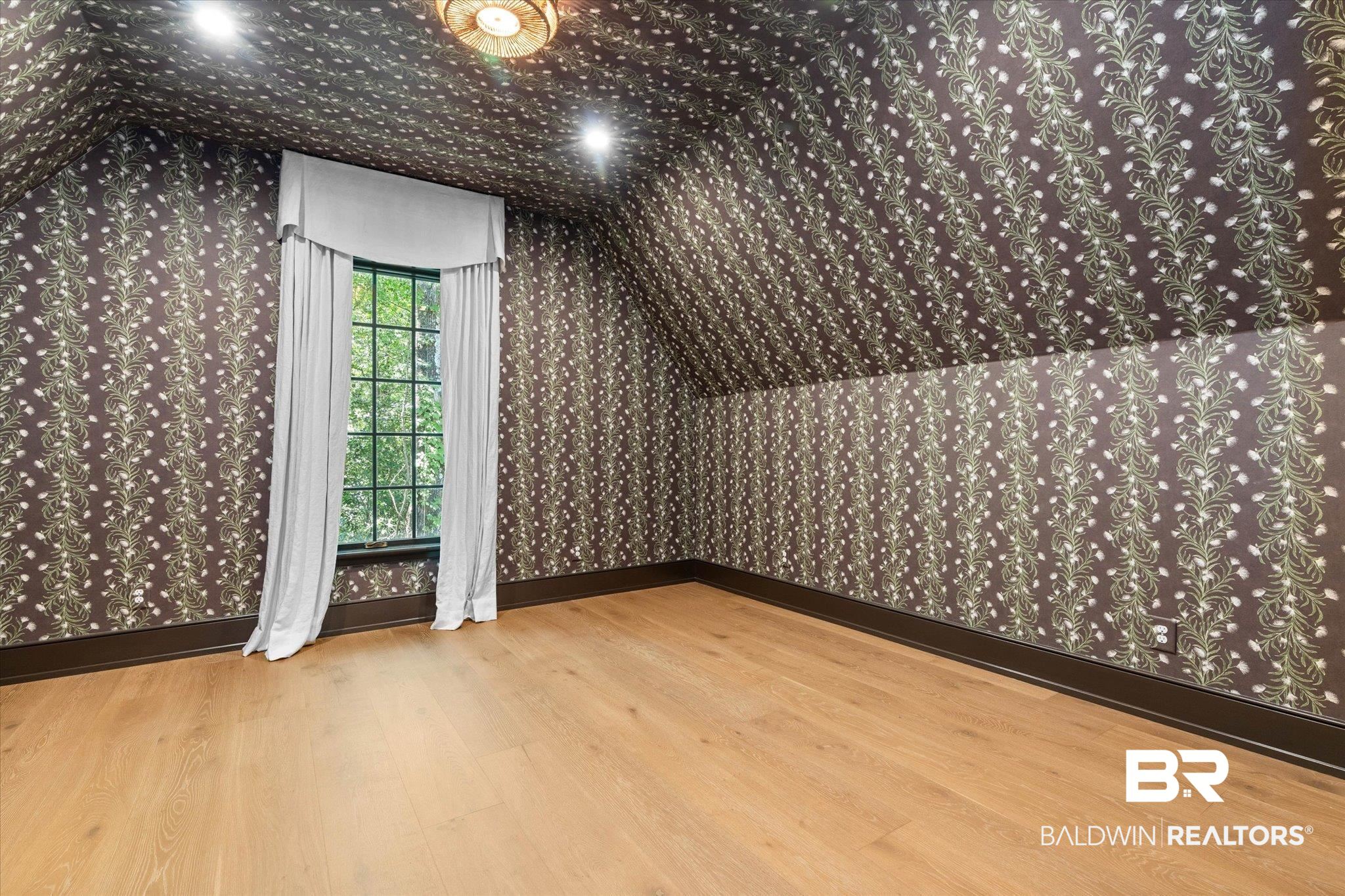 3 Canterbury Park Mobile, AL 36608 - Photo 29 of 43 Bonus room featuring wallpapered walls, wood finished floors, and baseboards