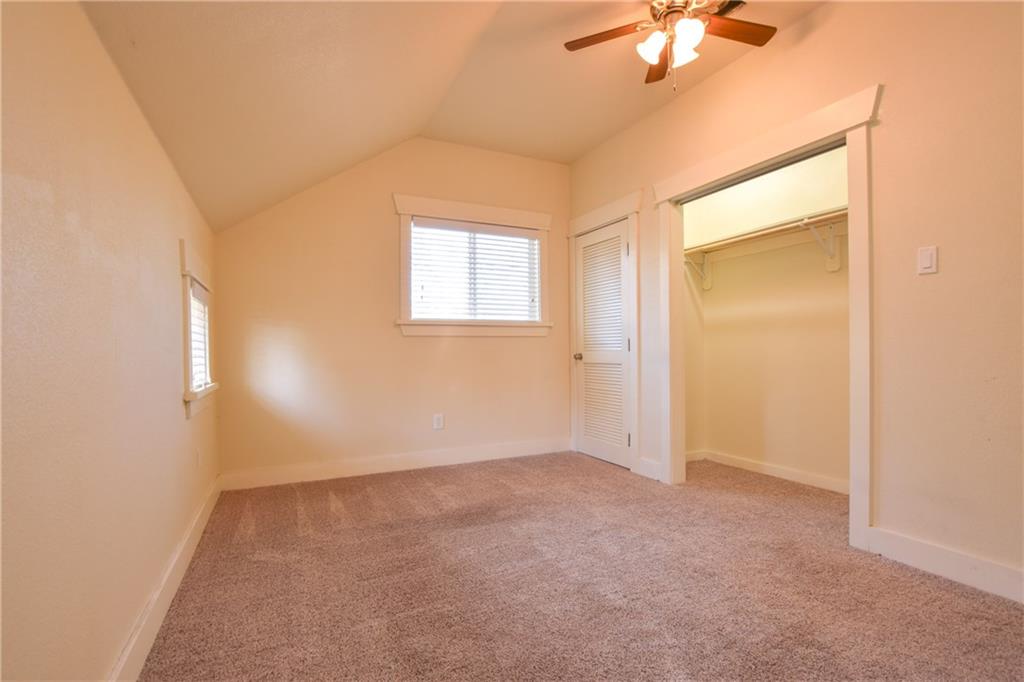 5405 Avenue H, Unit B Austin, TX 78751 - Photo 6 of 13 a view of an empty room with a window